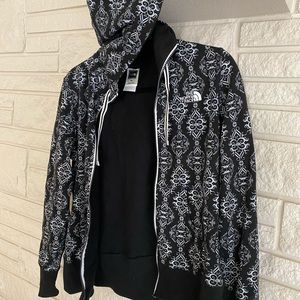 North Face black and white zip up hoodie.